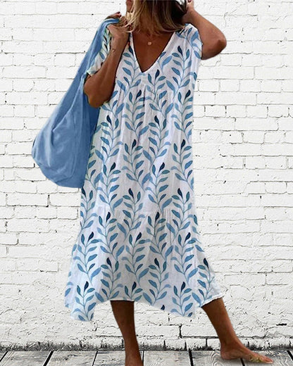 トレンディなVネック葉柄ミディドレス – Nea